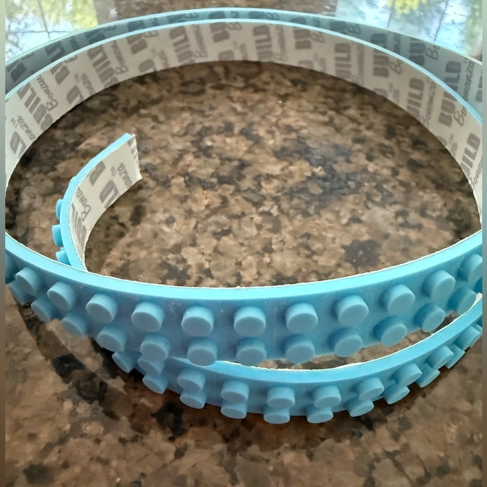 New. 3 ft of LEGO compatible adhesive tape strip for building blocks and display
